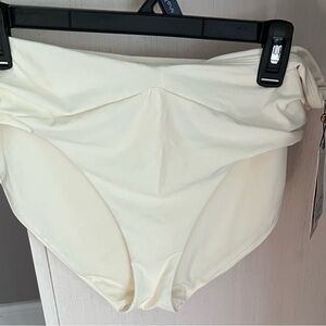 NWT-Calia Carrie Underwood swim suit bottom size L. Beautiful ivory color